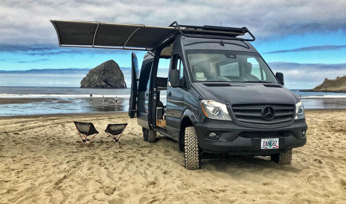 Picture of a Sprinter Van with an extended awning at the beach in Oregon